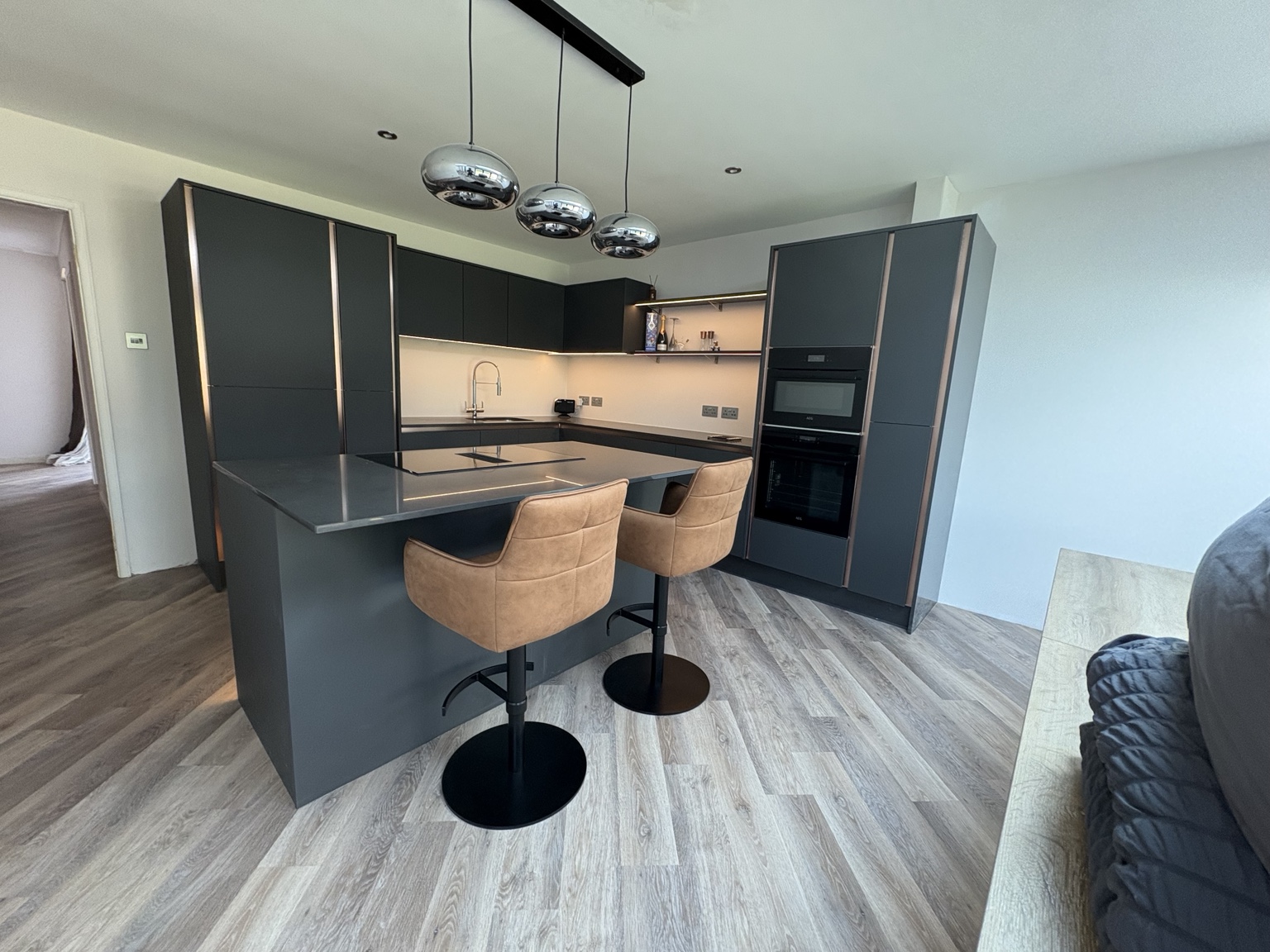 Modern graphite kitchen with breakfast seating